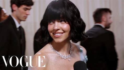 Sydney Sweeney's Stunning Black Wig & Miu Miu Dress .